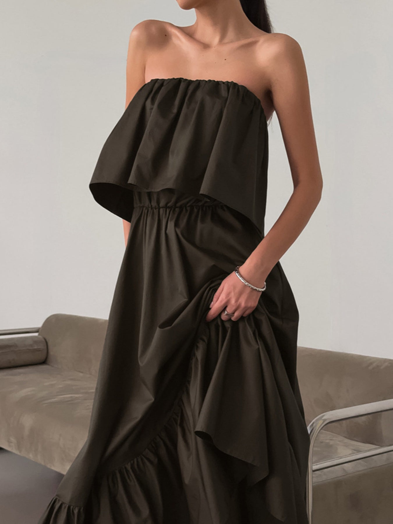 Side view of breathable tiered maxi dress showing ruffle hem buy sustainable clothing online, sustainable clothing for women, eco friendly clothing women